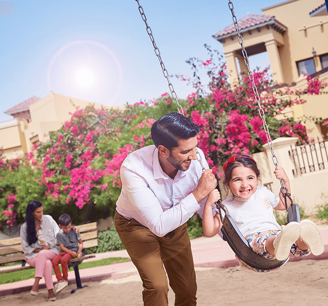 family playing at kids area